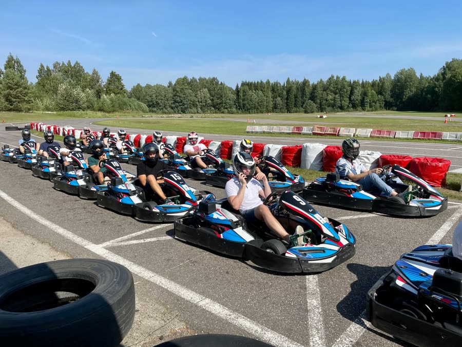 The team on the grid before a karting race